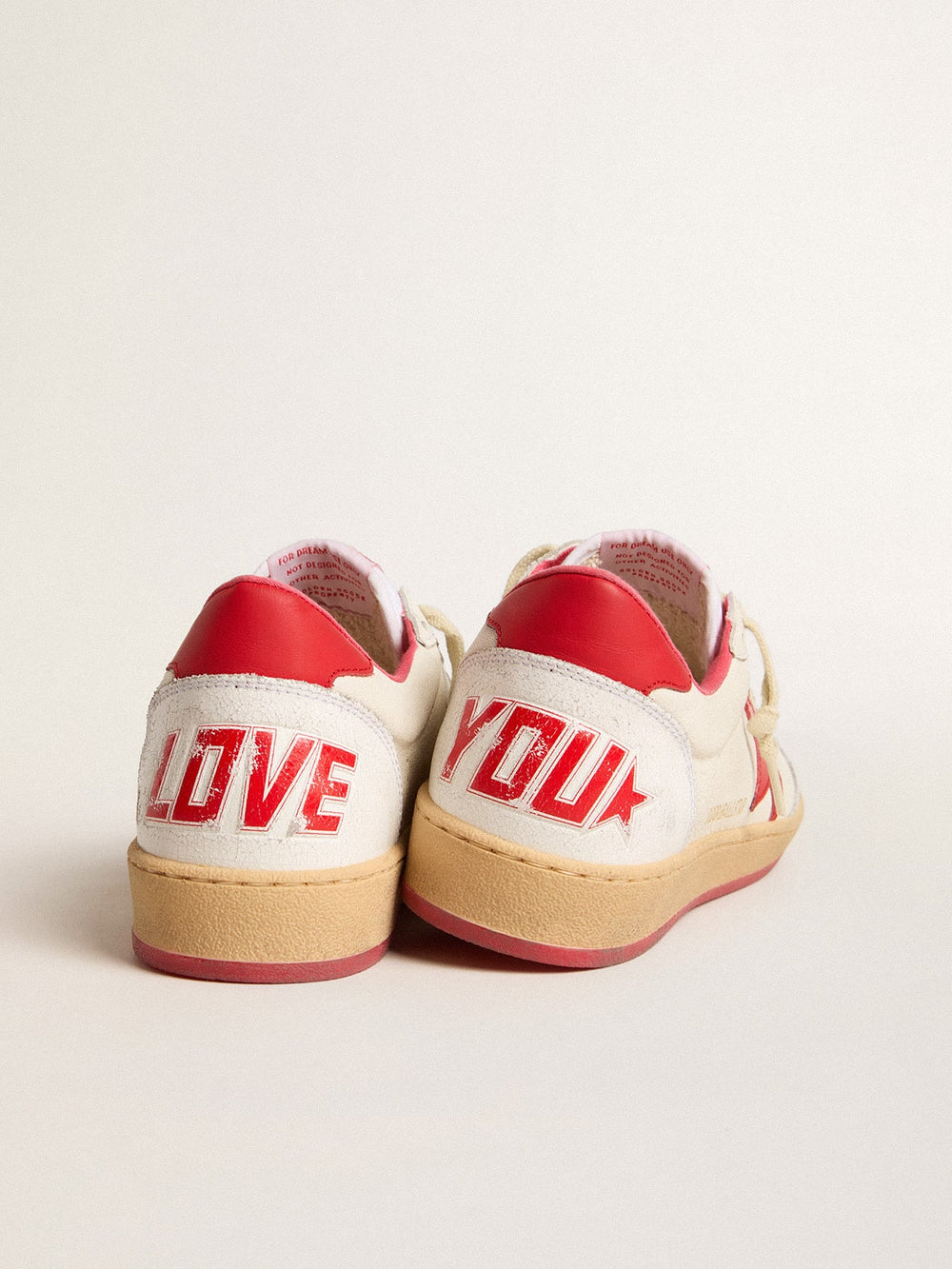 Golden Goose Men’s Ball Star Wishes in white leather with a red star and heel tab