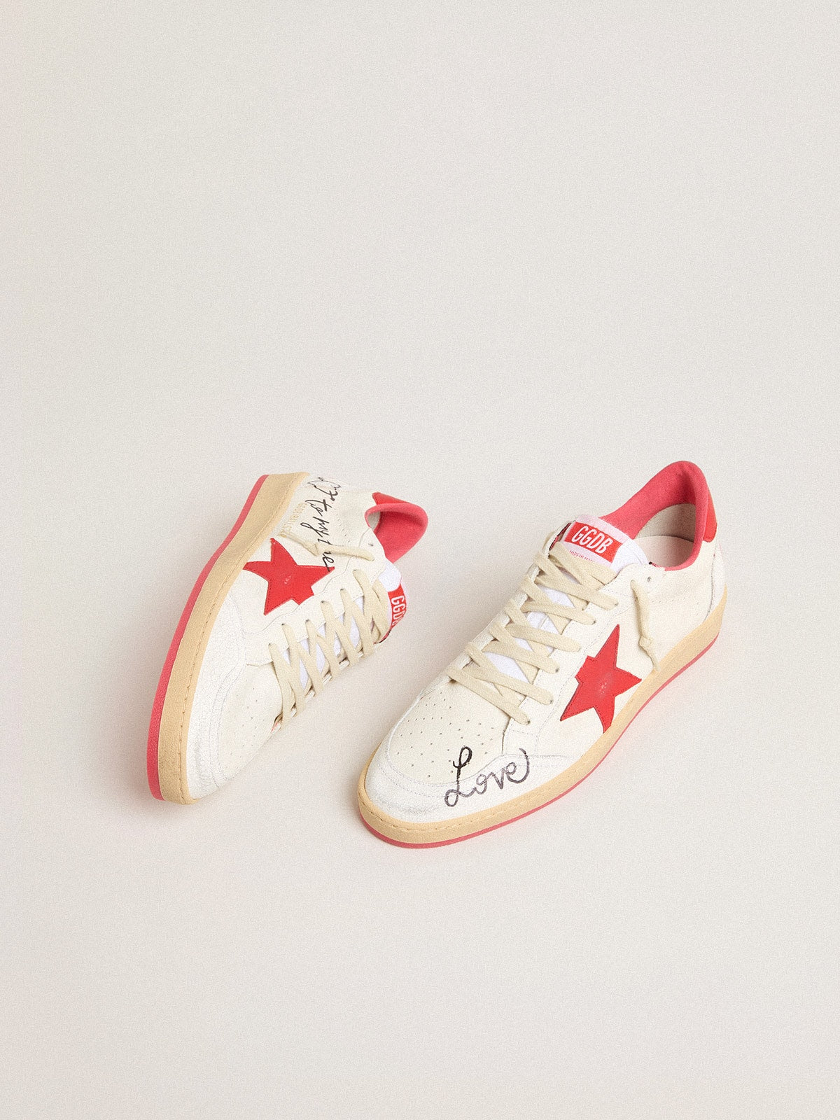 Golden Goose Men’s Ball Star Wishes in white leather with a red star and heel tab