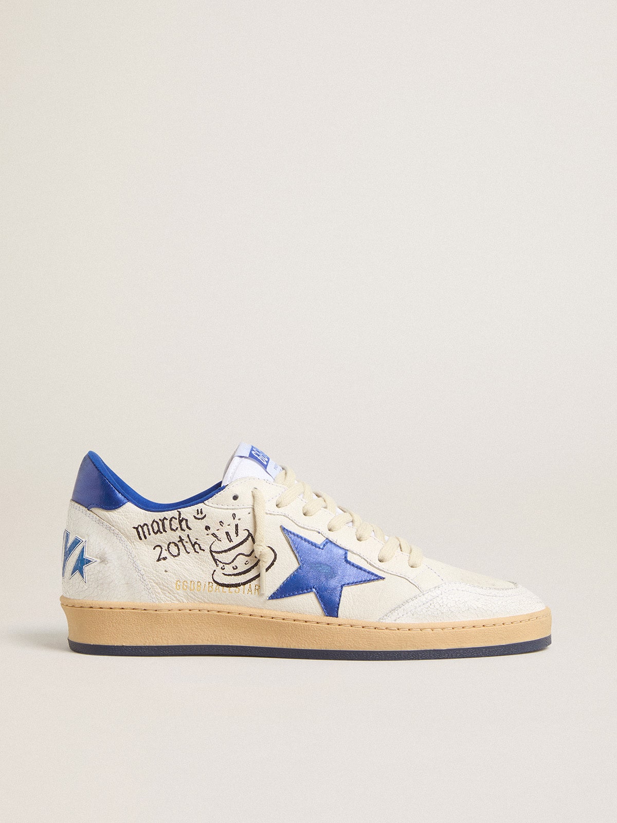 Golden Goose Men's Ball Star Wishes in white nappa leather with a bright blue star and heel tab