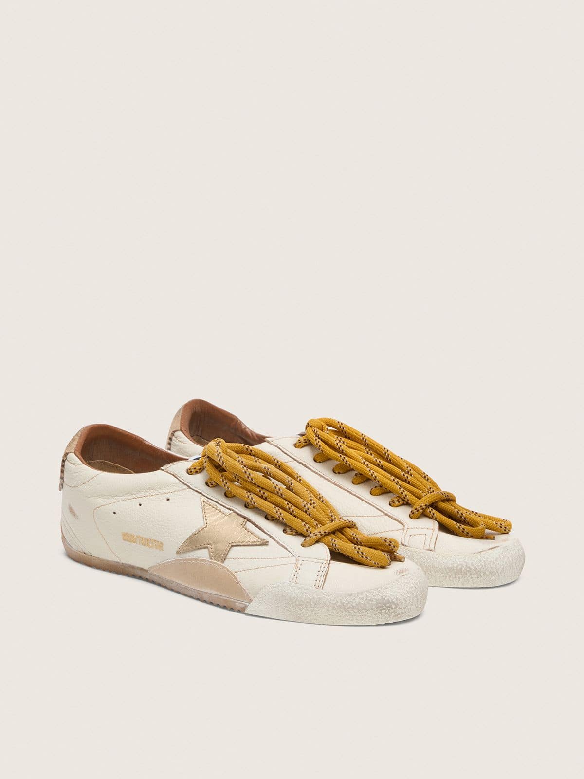 Golden Goose Men's True-Star in white nappa leather with gold foiled leather star and beige suede heel tab