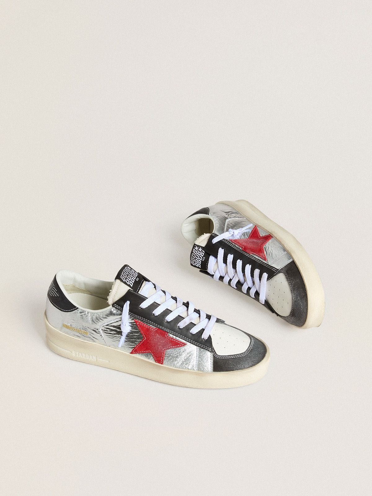 Golden Goose Men’s Stardan in laminated silver nylon with burgundy suede star