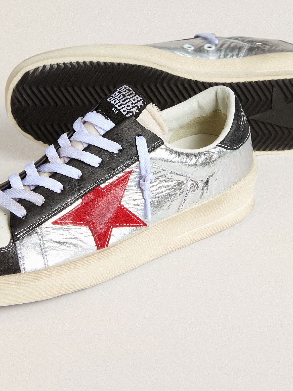 Golden Goose Men’s Stardan in laminated silver nylon with burgundy suede star
