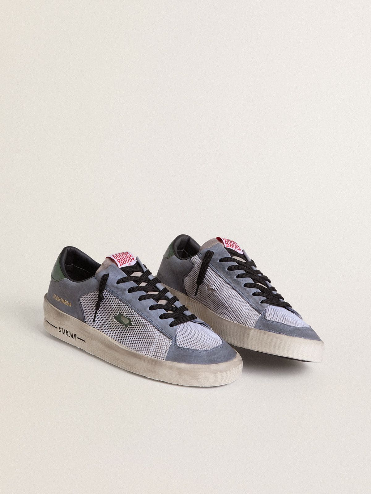 Golden Goose Men's Stardan in powder-blue suede with green leather star and heel tab