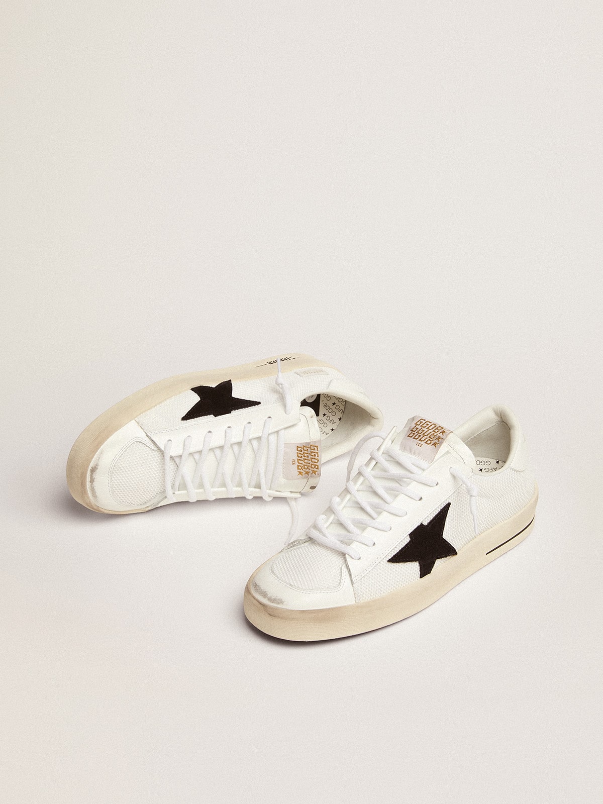 Golden Goose Men's Stardan in white mesh with black suede star