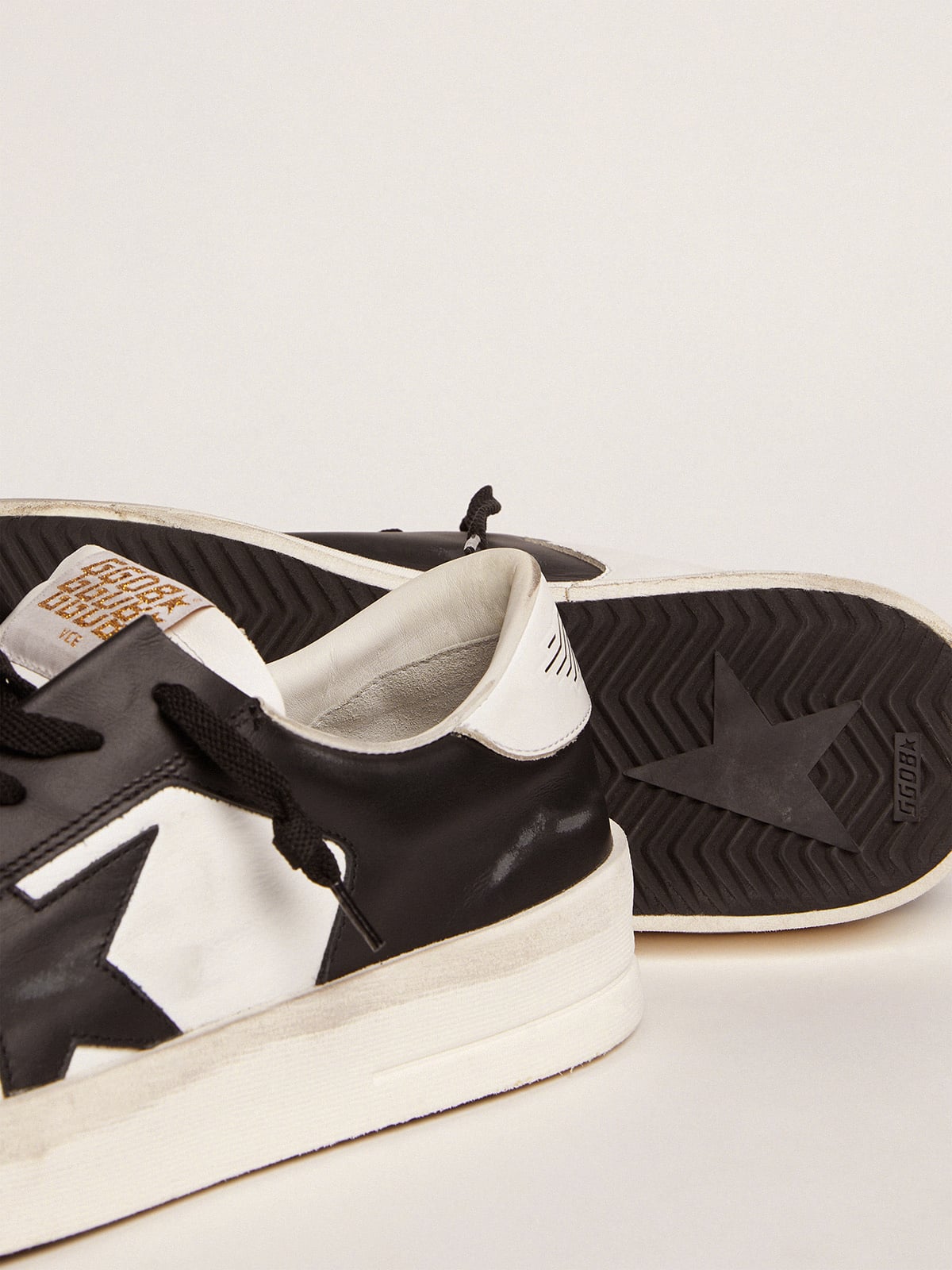 Golden Goose Men's Stardan in white and black leather