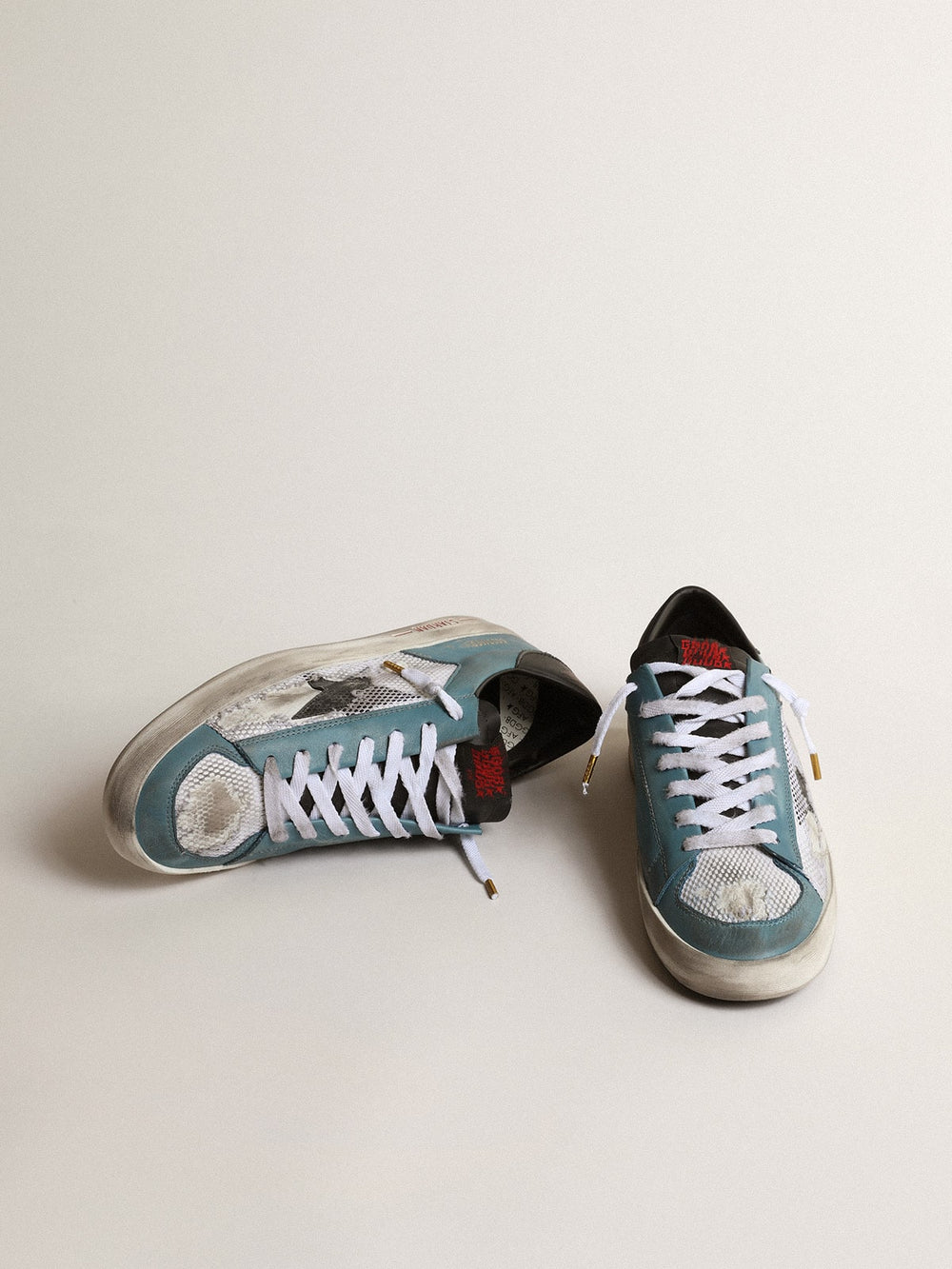 Golden Goose Men's Stardan in distressed mesh and petrol-colored upper