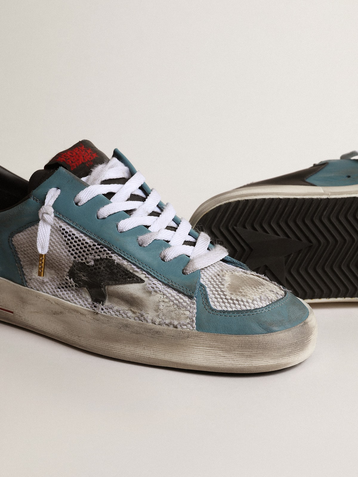 Golden Goose Men's Stardan in distressed mesh and petrol-colored upper