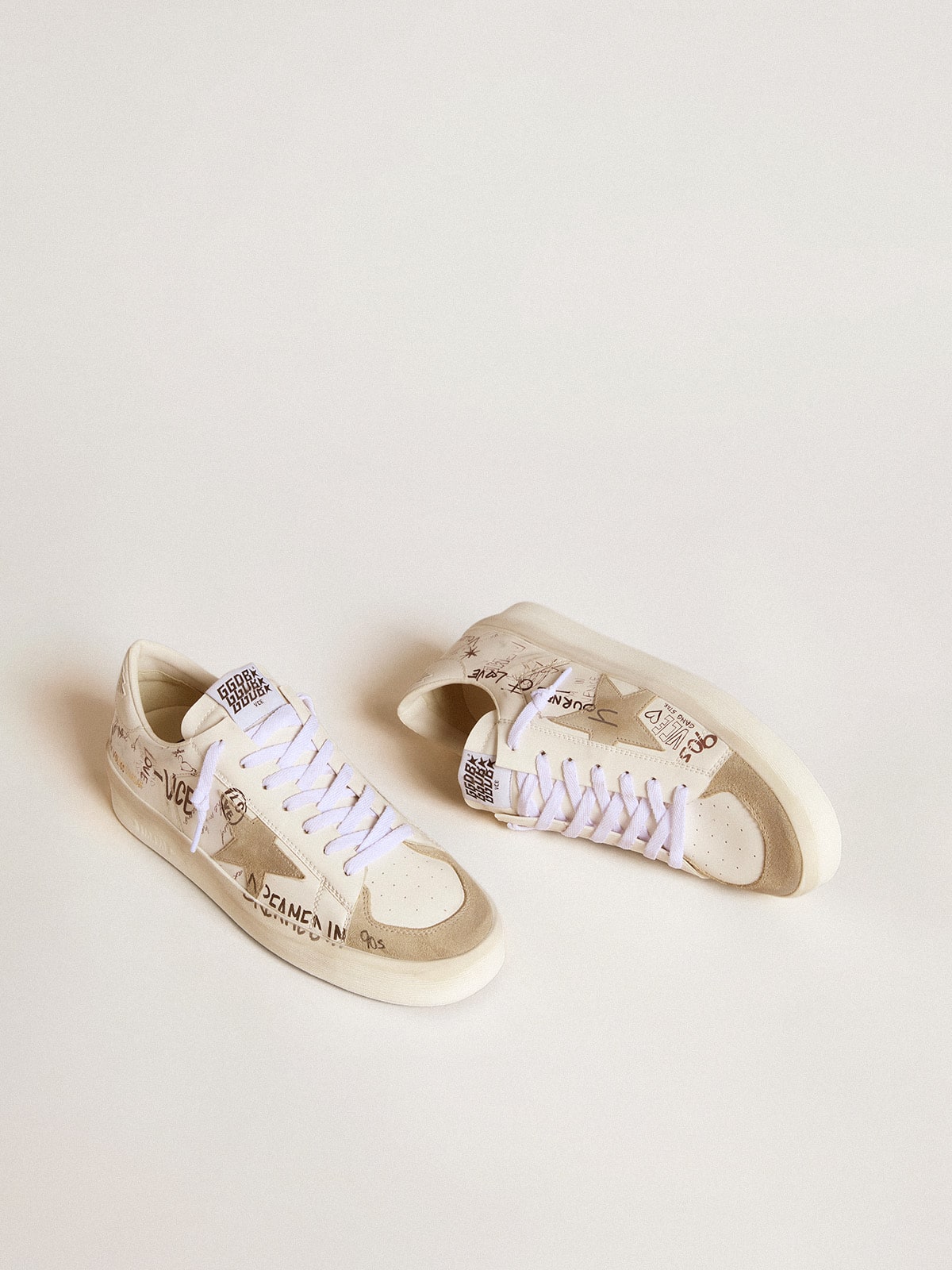 Golden Goose Stardan in leather with all-over lettering and ice-gray suede star