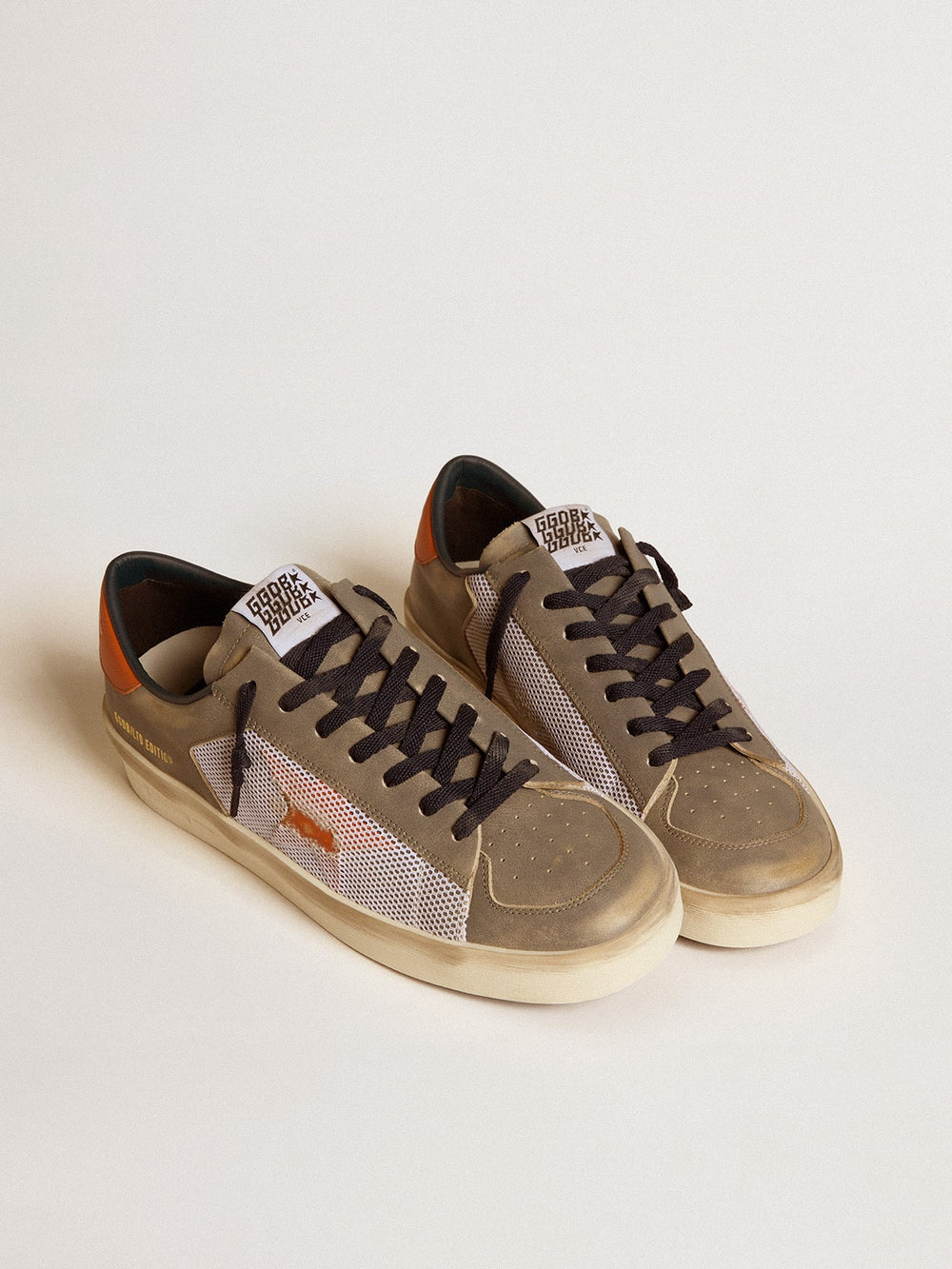 Golden Goose Stardan LTD in gray leather and mesh with leather star and heel tab