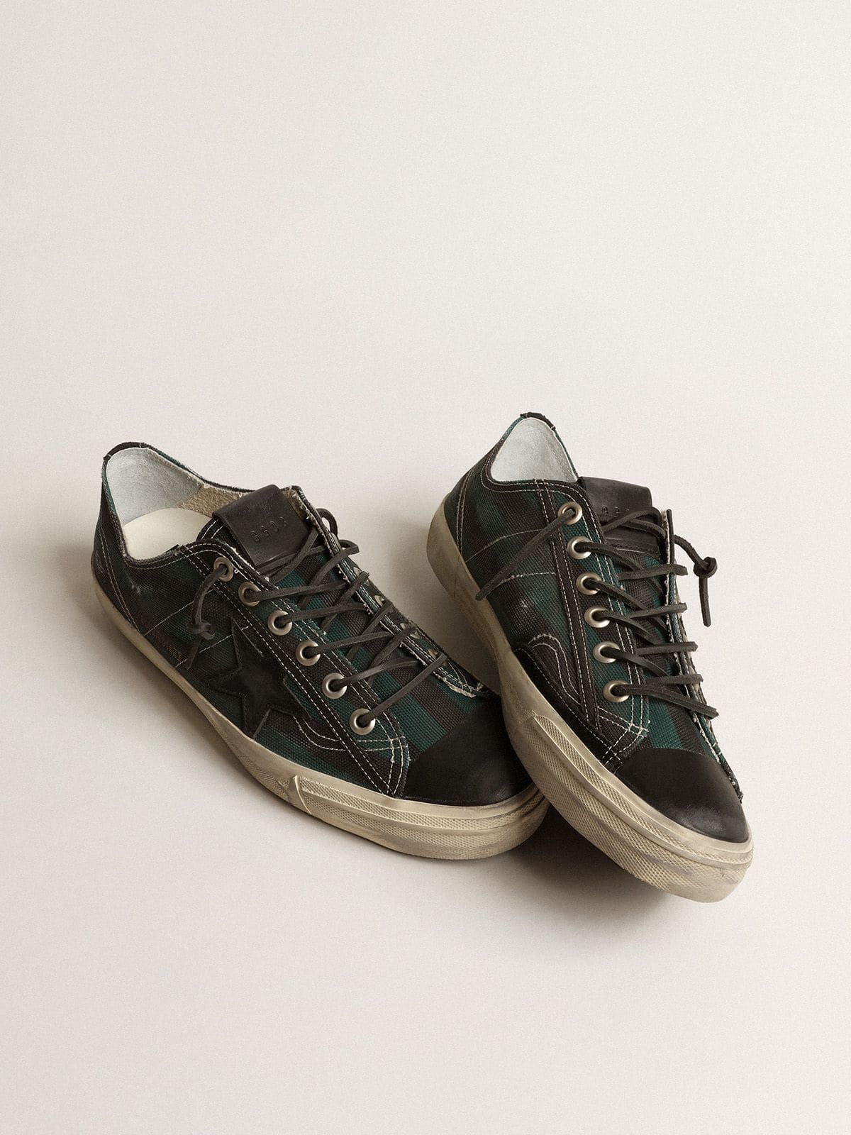 Golden Goose Men's V-Star in black and green striped canvas with black leather star and toe