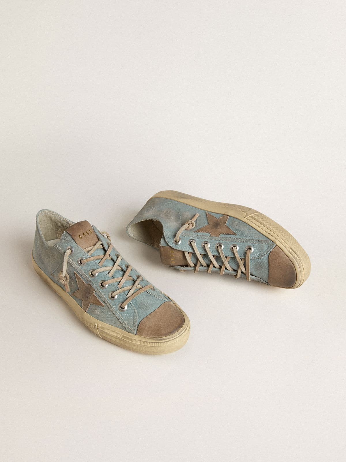 Golden Goose Men's V-Star in light blue canvas with dove-gray leather star