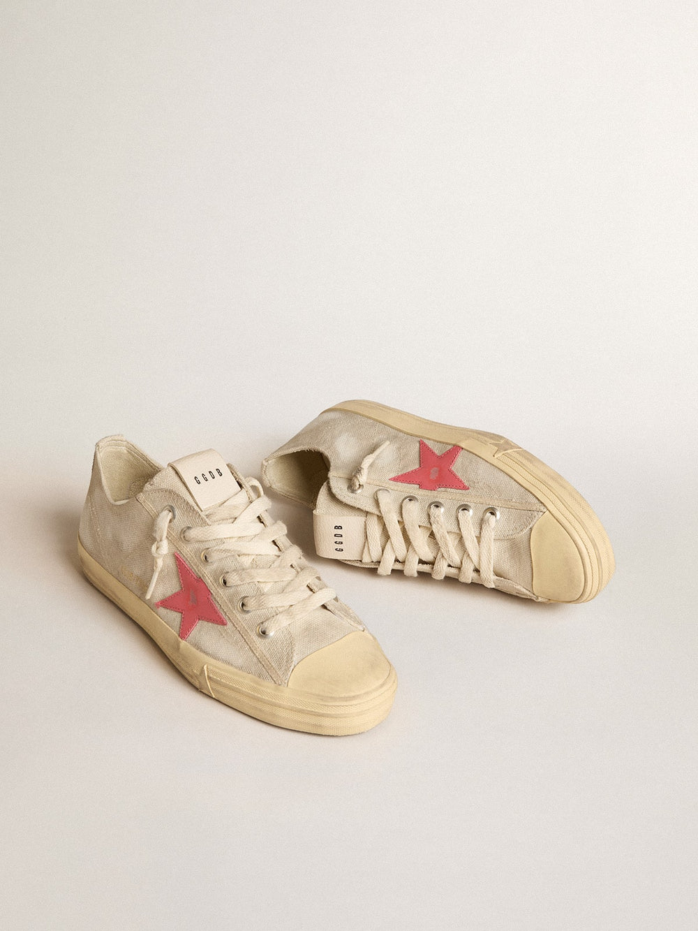 Golden Goose Men's V-Star in light gray canvas with a red leather star