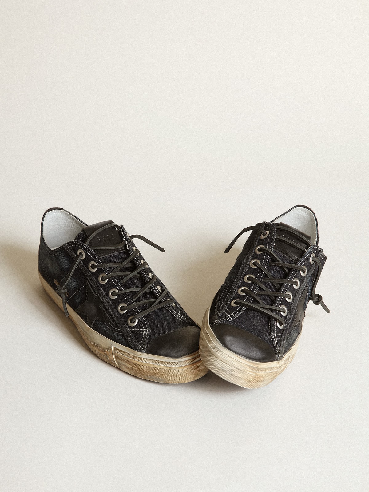 Golden Goose V-Star sneakers in midnight-blue denim with black leather star and toe