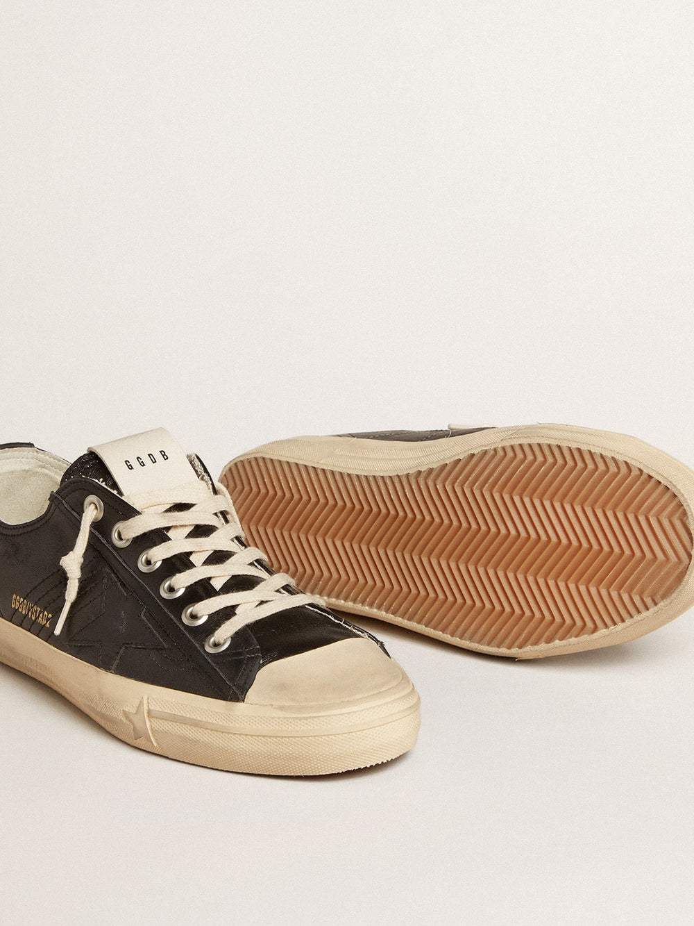 Golden Goose Men's V-Star in black nappa leather with a black leather star