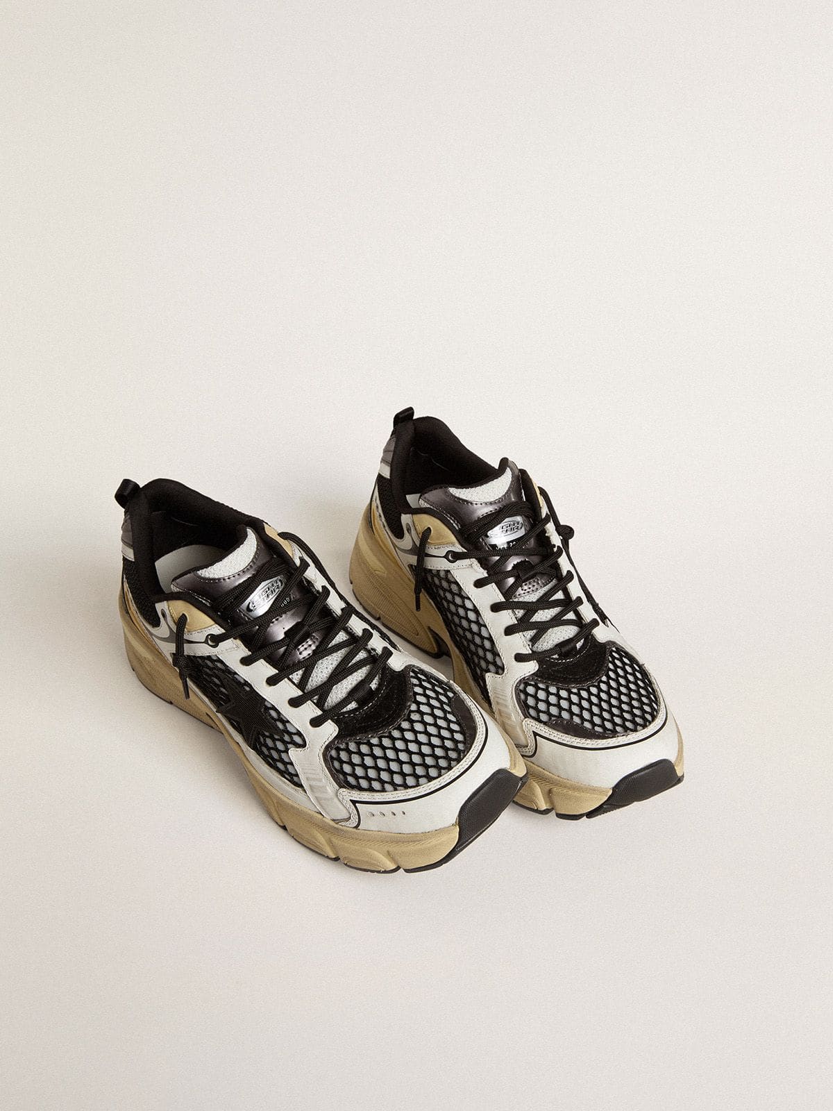 Golden Goose Men’s Lightstar in white leather and black mesh with black TPU star