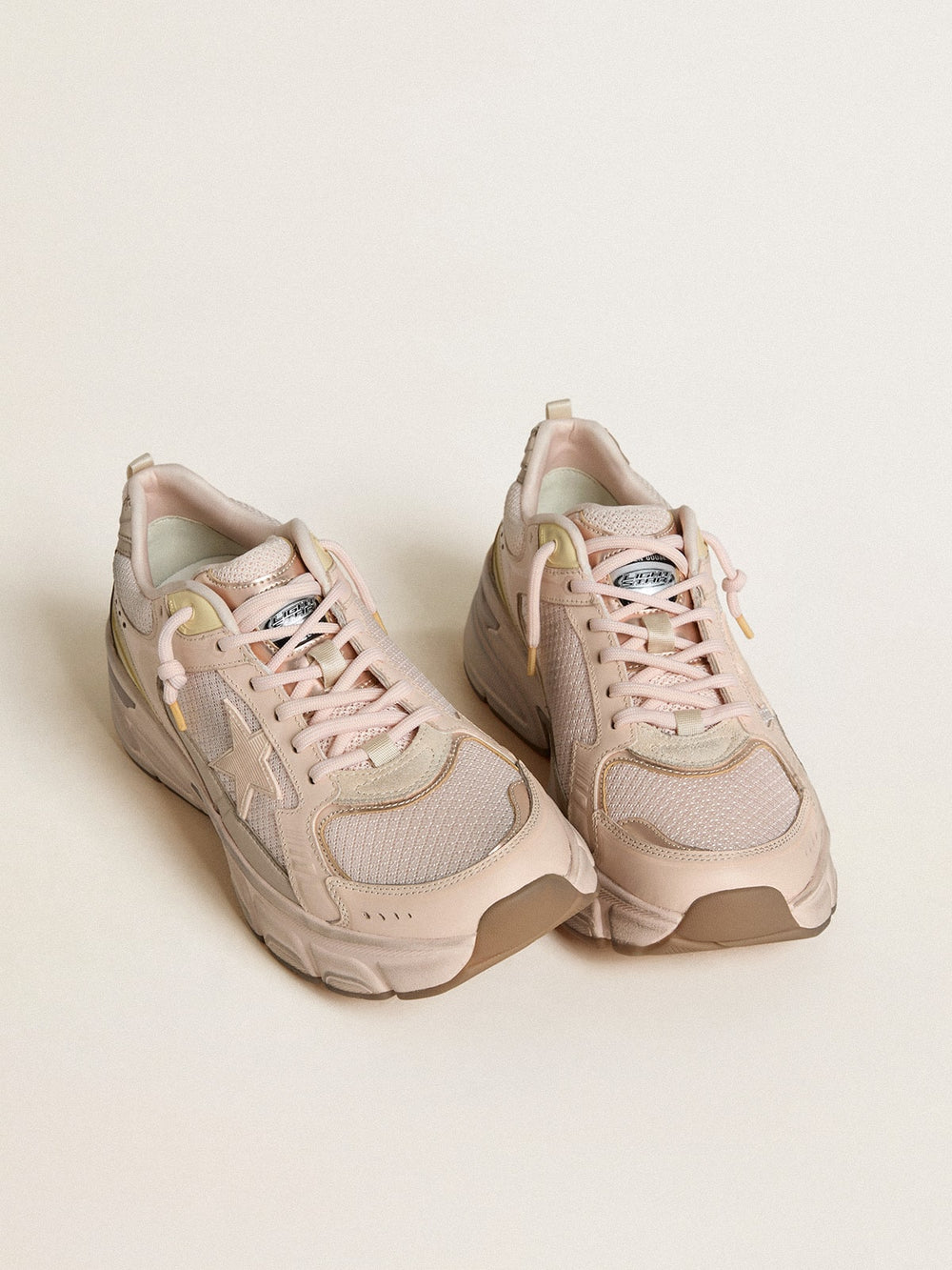 Golden Goose Men’s Lightstar with pink leather and mesh upper and pink star