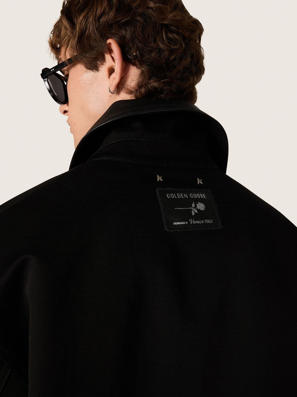 Golden Goose Men's short padded jacket in black cotton with leather collar