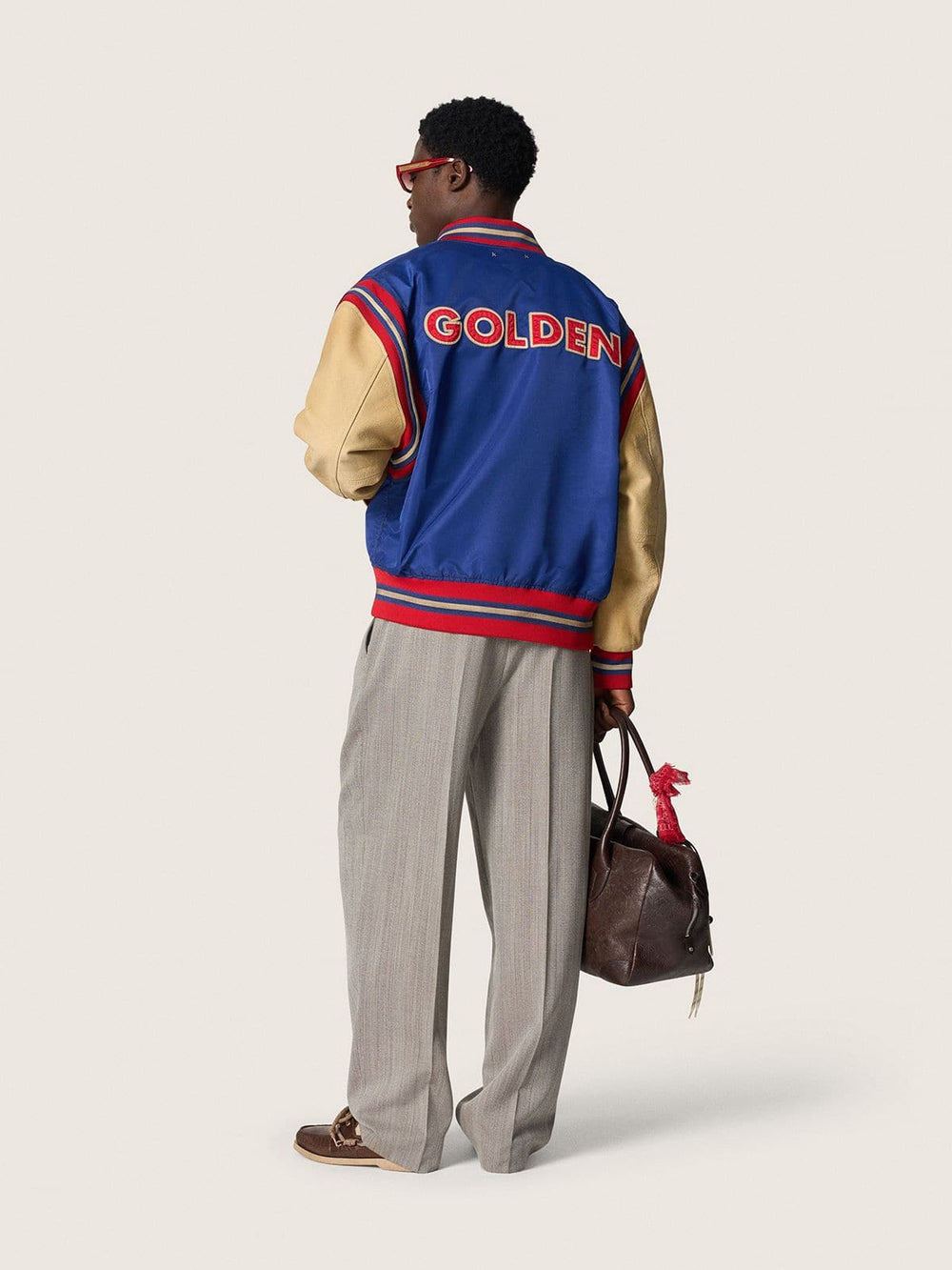 Golden Goose Men’s beige crew neck sweater with ‘Golden’ lettering on the back