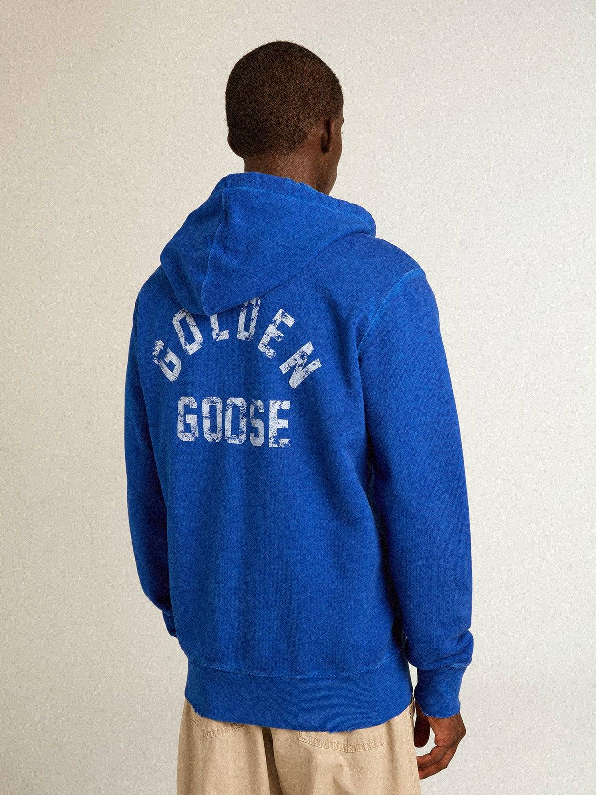 Golden Goose Men's blue-colored hoodie with lettering on the back