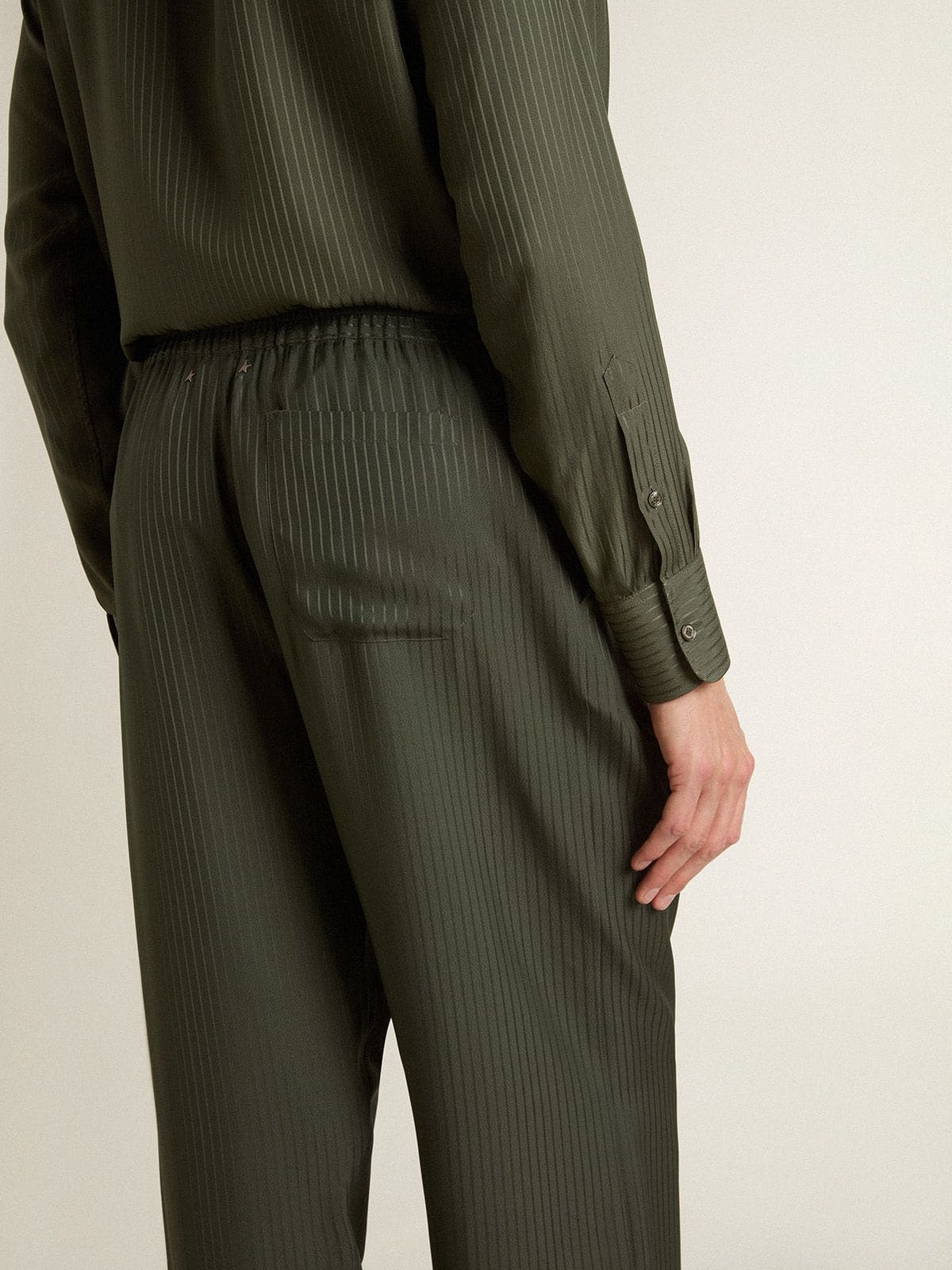 Golden Goose Men's dark green joggers with vertical stripes