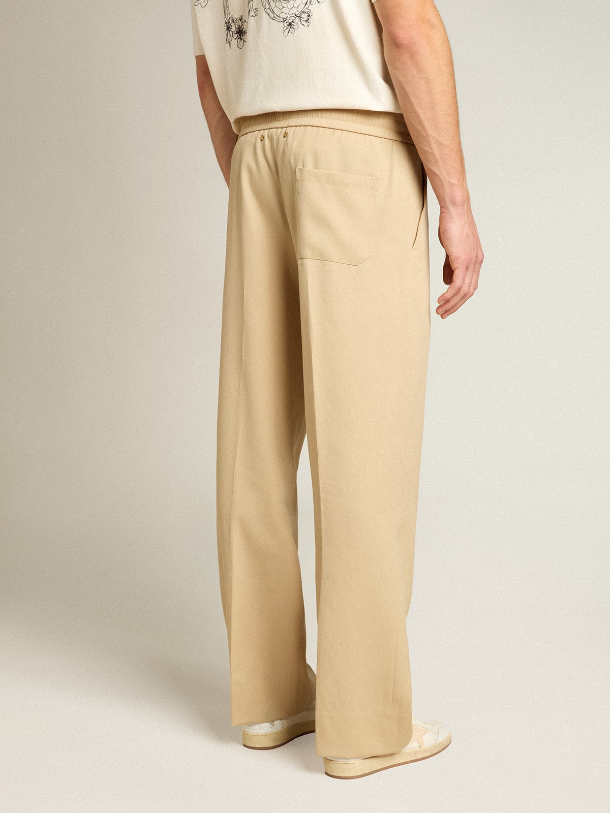Golden Goose Men’s sand-colored joggers with pocket on the back
