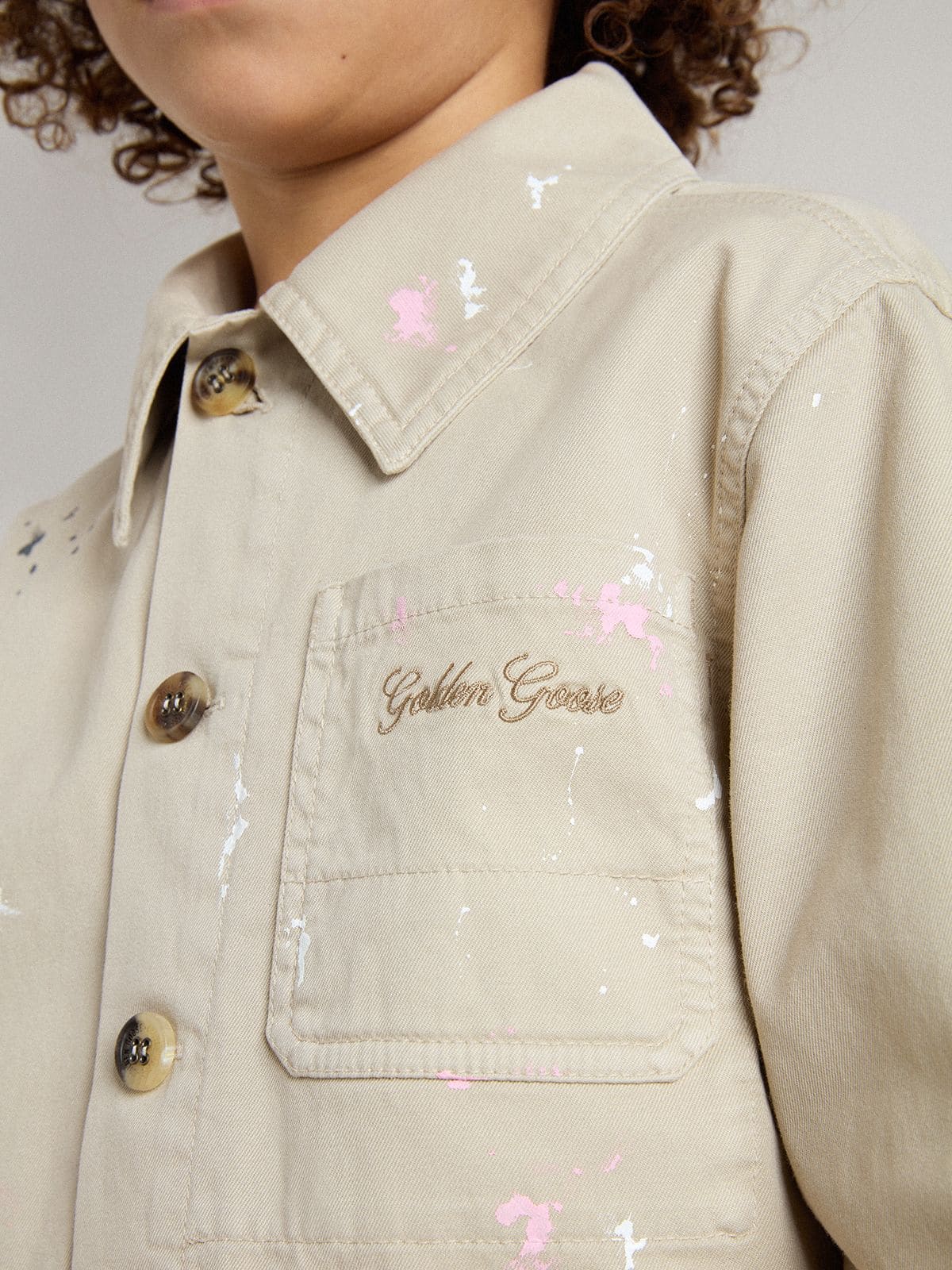 Golden Goose Kids’ beige jacket with multicolor splashes