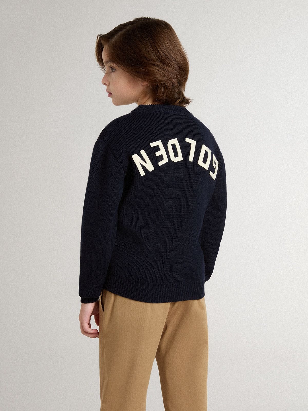 Golden Goose Boys’ blue crew-neck sweater with 'Golden' lettering on the back