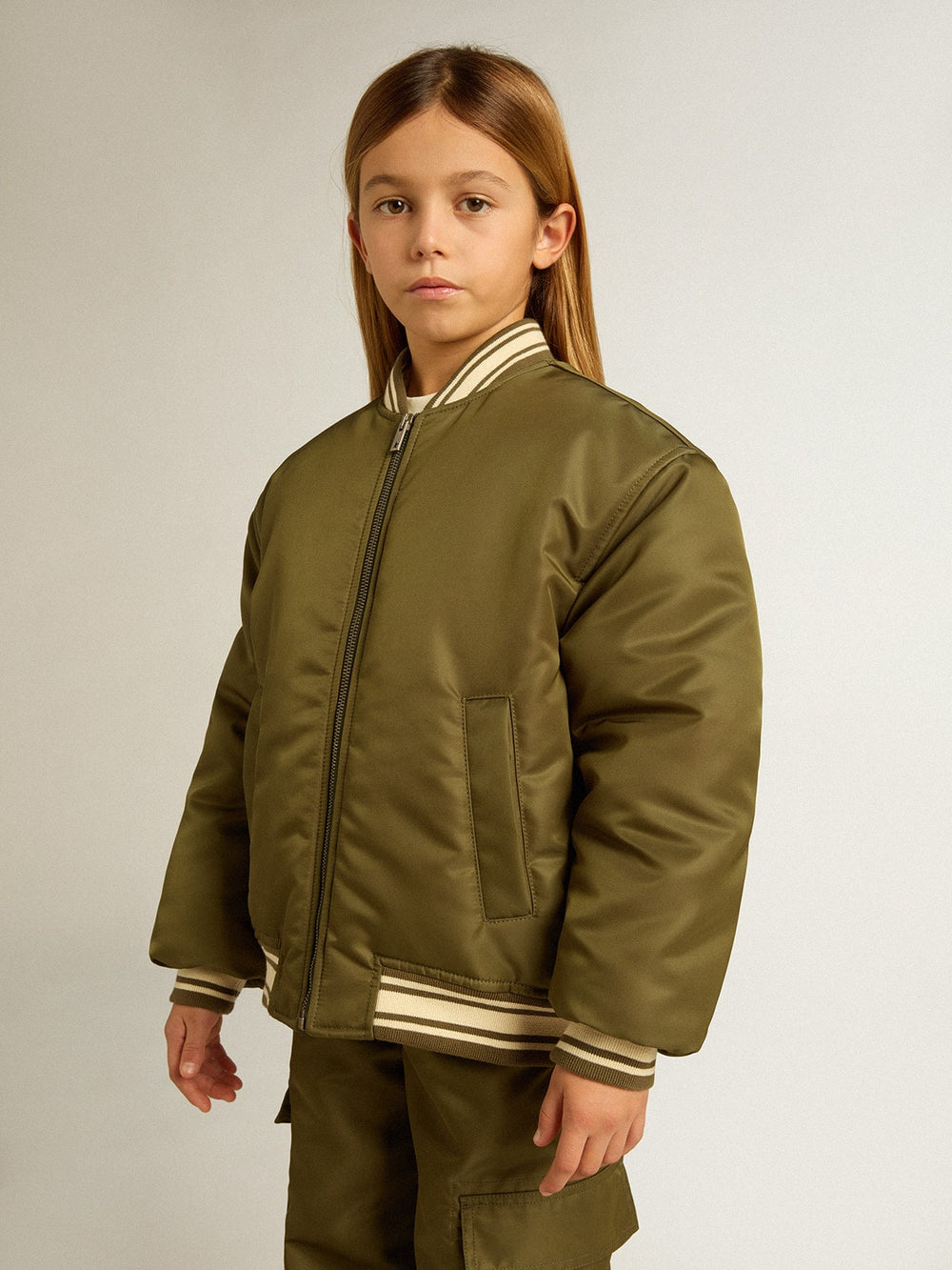Golden Goose Kids military-green nylon bomber jacket with lettering on the back