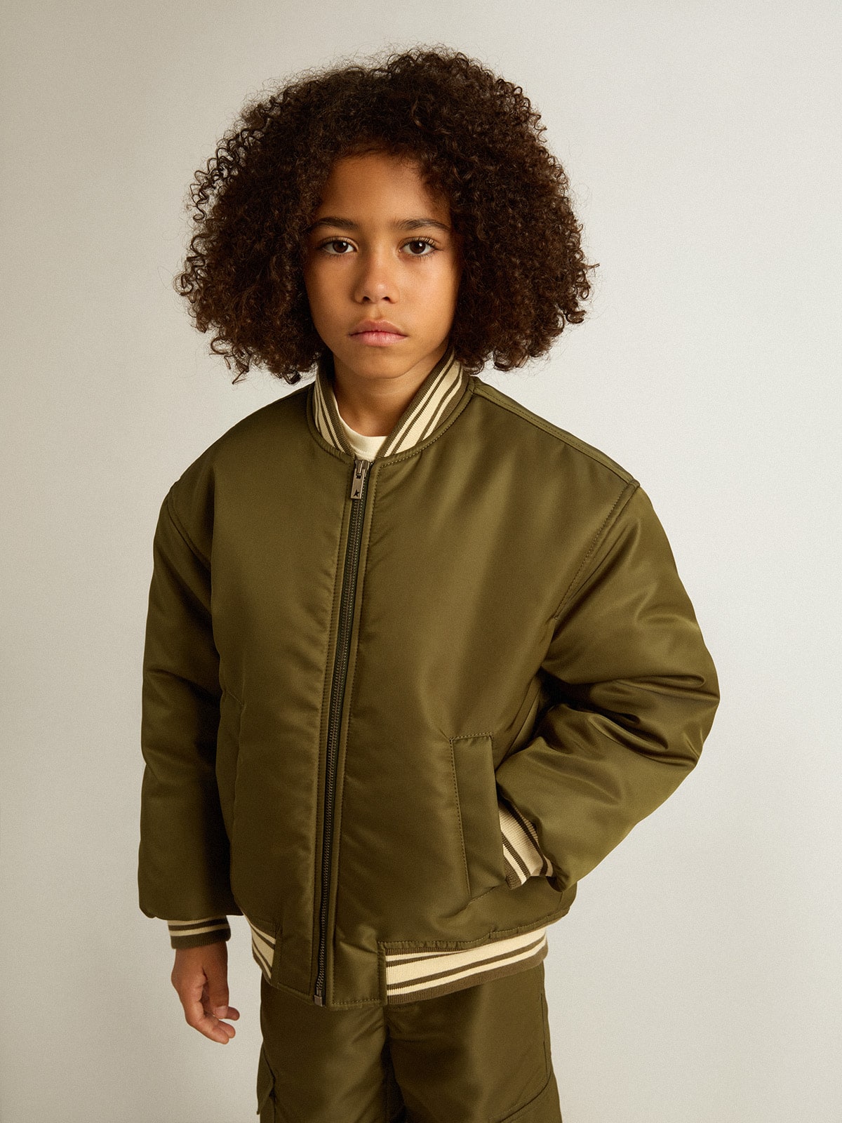 Golden Goose Kids military-green nylon bomber jacket with lettering on the back