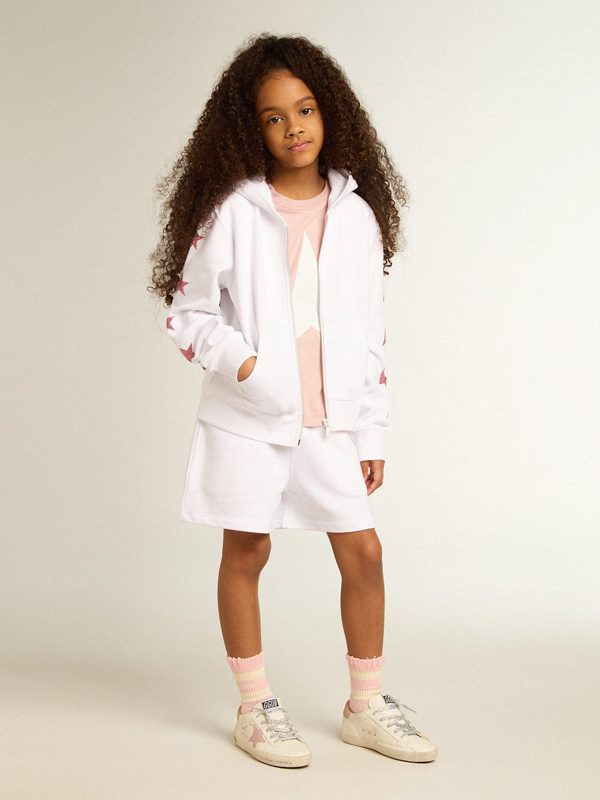 Golden Goose Girls’ zip-up sweatshirt in white with glitter stars on the sleeves