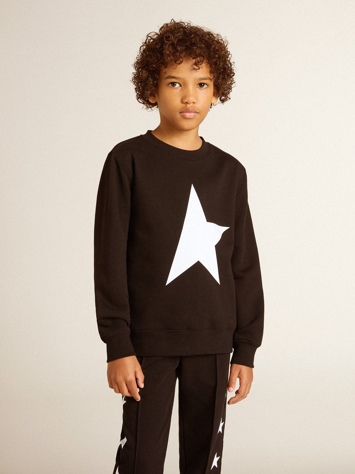 Golden Goose Boys’ black sweatshirt with white maxi star on the front