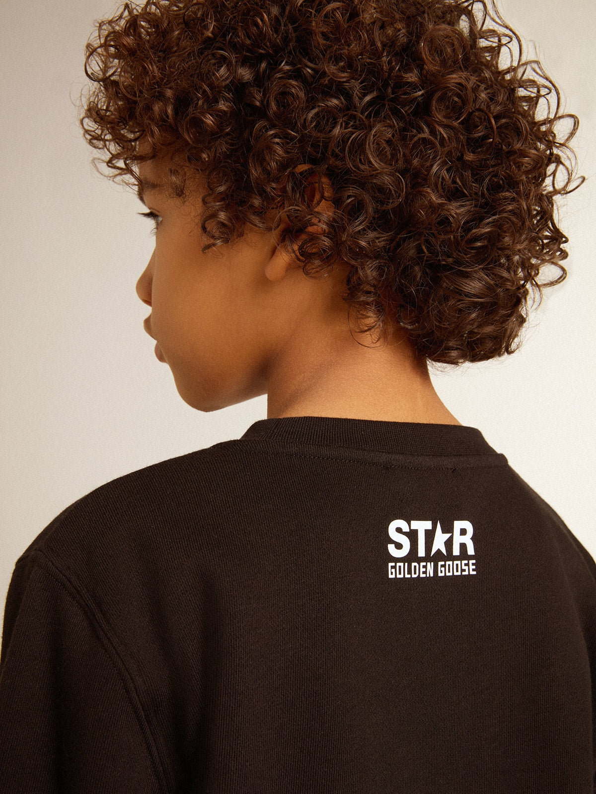 Golden Goose Boys’ black sweatshirt with white maxi star on the front