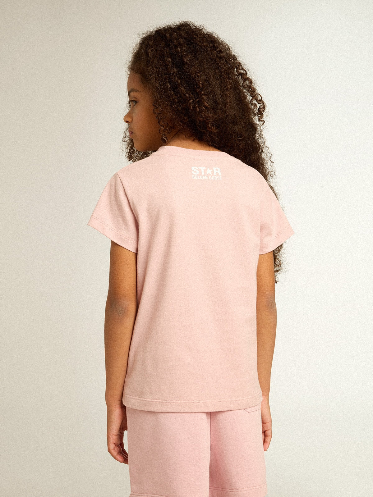 Golden Goose Girls’ pink T-shirt with white logo and maxi star
