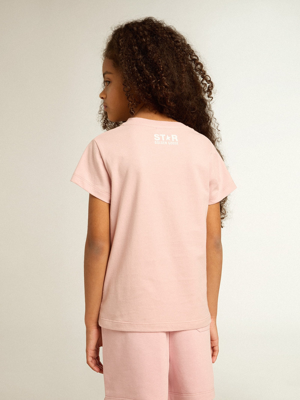 Golden Goose Girls’ pink T-shirt with white logo and maxi star