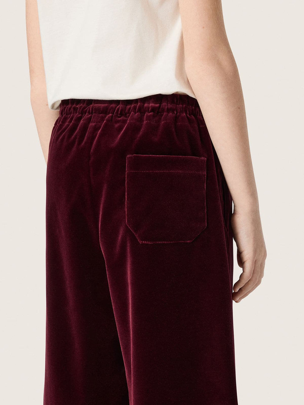 Golden Goose Girls’ burgundy velvet-effect pants with rear pocket