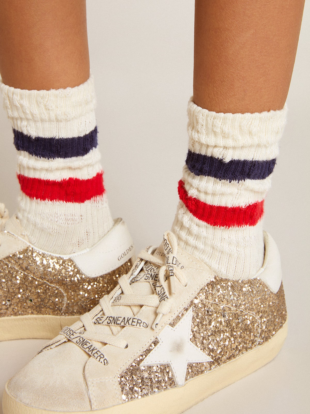 Golden Goose Socks in distressed-finish white cotton with red and navy stripes
