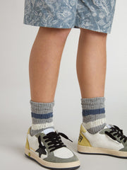 Golden Goose Kids’ gray socks with distressed details and worn-white and blue stripes