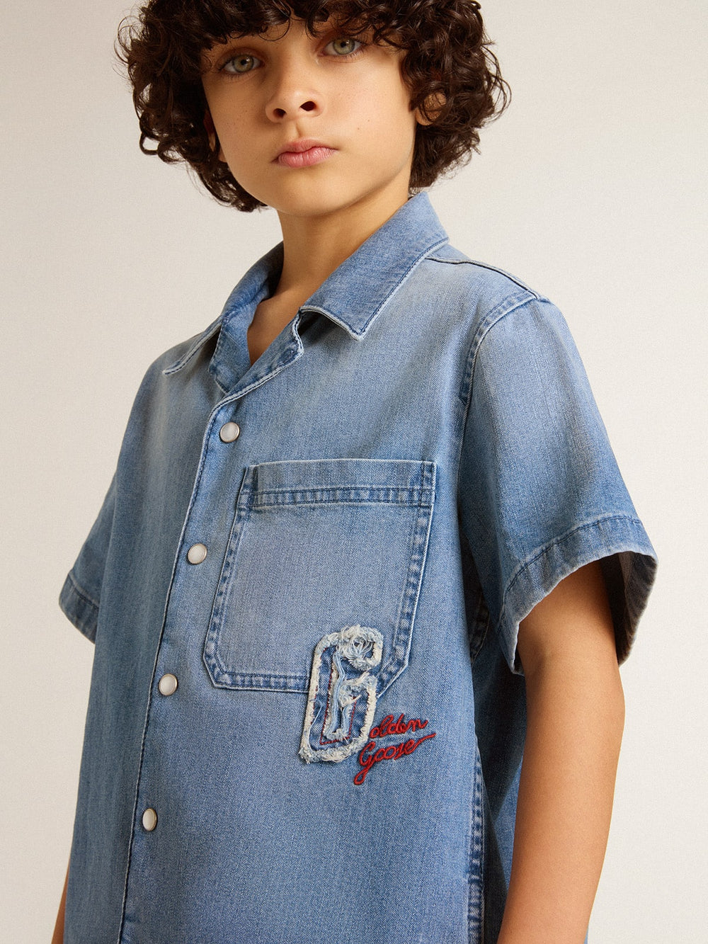 Golden Goose Kids’ denim shorts with embroidery on the back