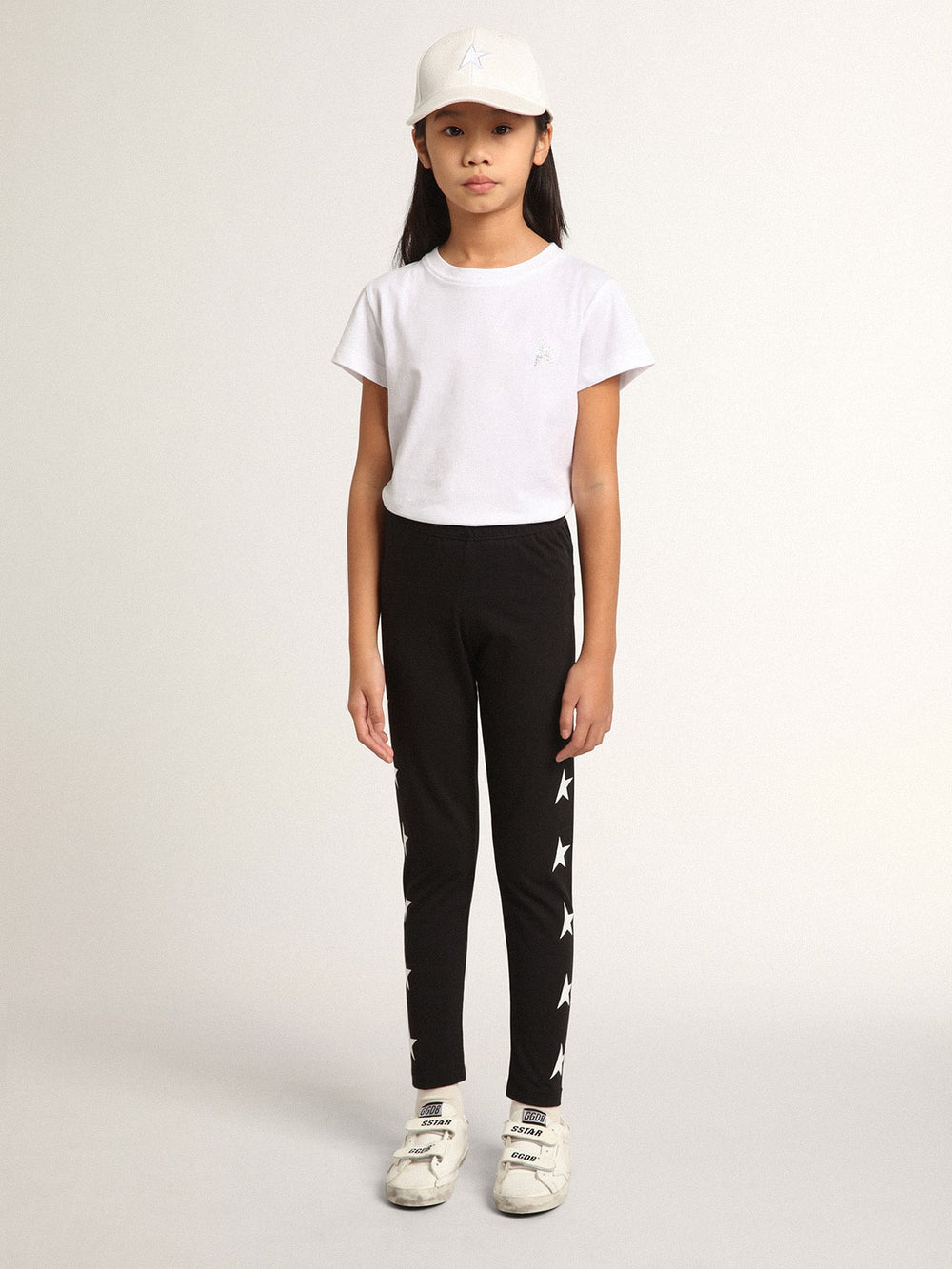 Golden Goose Girls’ black leggings with white stars on the sides
