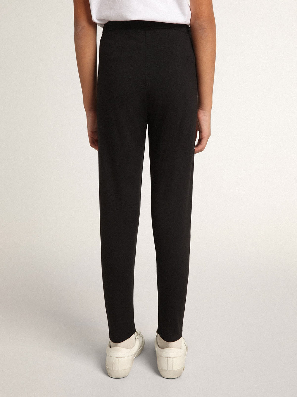 Golden Goose Girls’ black leggings with white stars on the sides