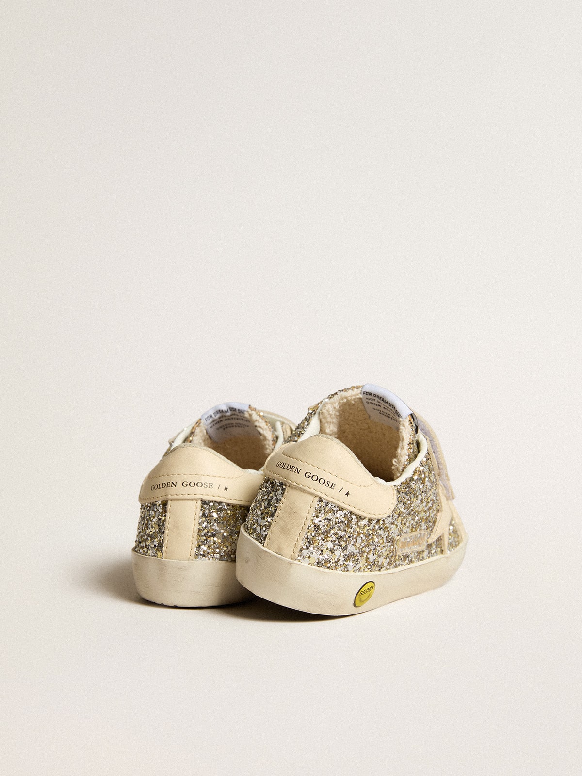 Golden Goose Old School Junior in platinum glitter with leather star and heel tab