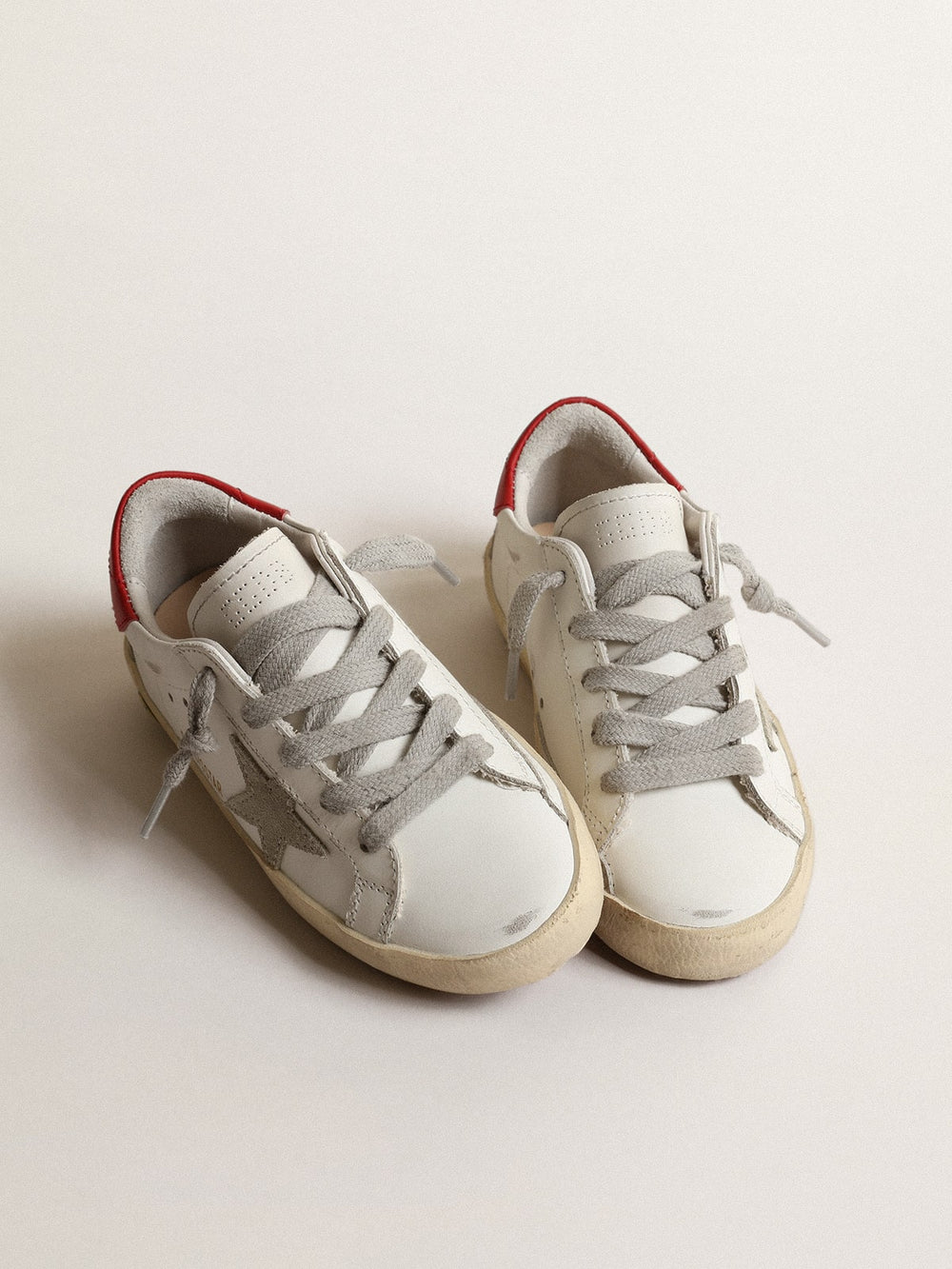 Golden Goose Super-Star Junior with suede star and red leather heel tab