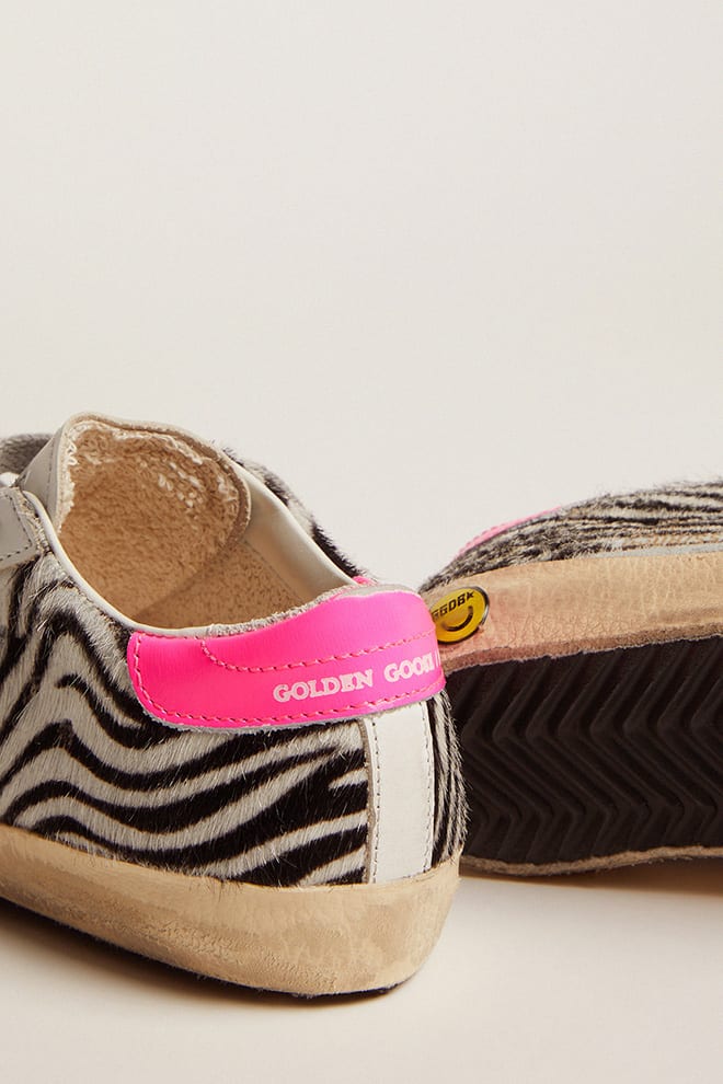 Golden Goose Junior Super-Star in leather and zebra-print pony skin with fuchsia heel tab
