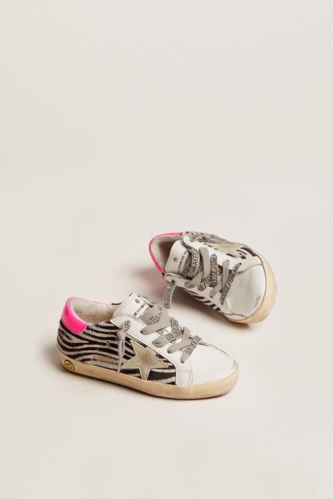 Golden Goose Junior Super-Star in leather and zebra-print pony skin with fuchsia heel tab
