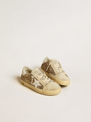 Golden Goose Super-Star Junior in gold glitter with white leather star and heel tab