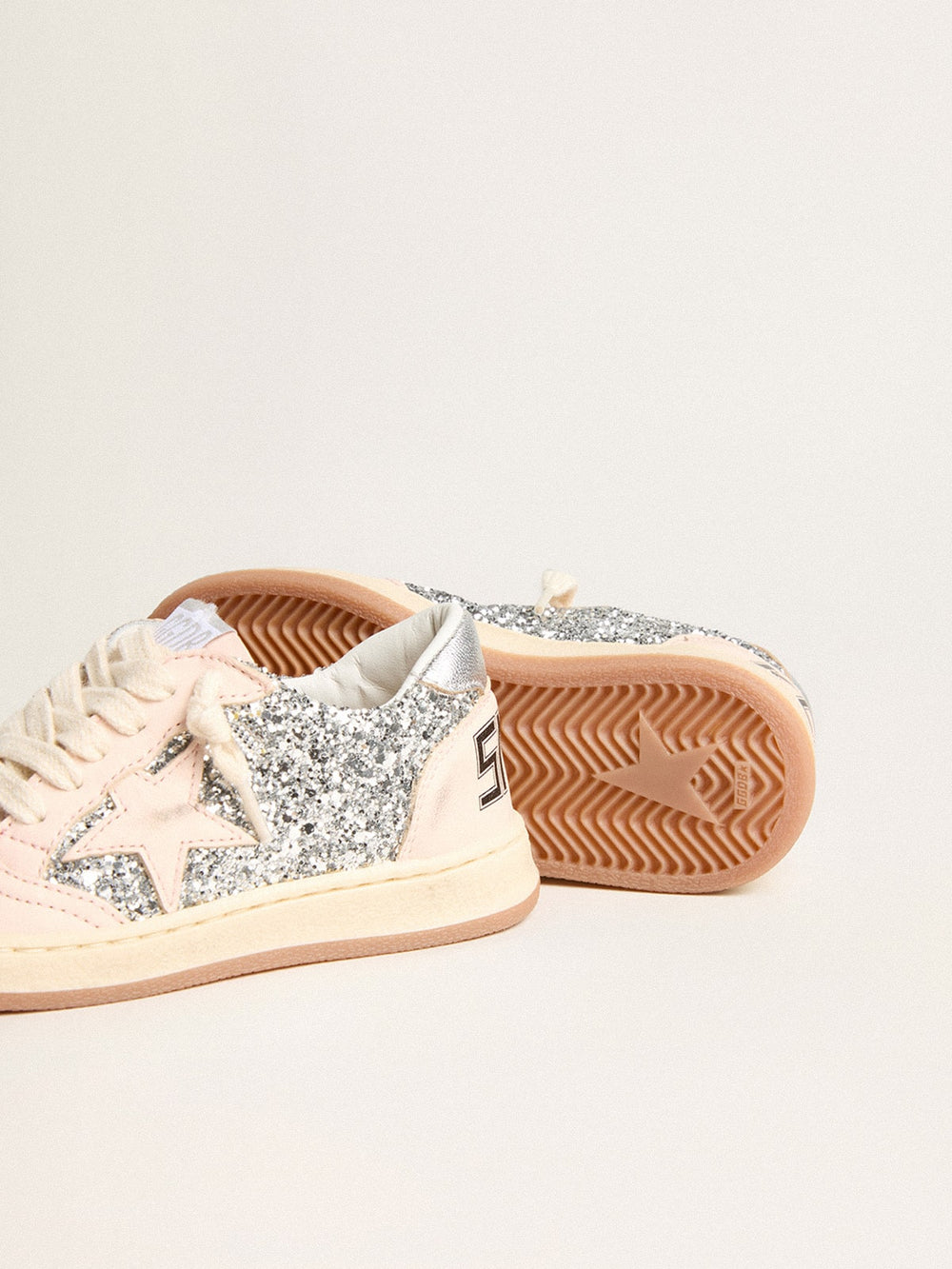 Golden Goose Junior Ball Star in glitter with silver metallic leather heel tab
