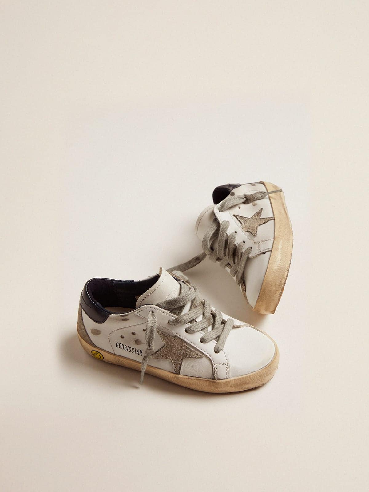 Golden Goose Junior Super-Star with gray suede star and blue heel tab
