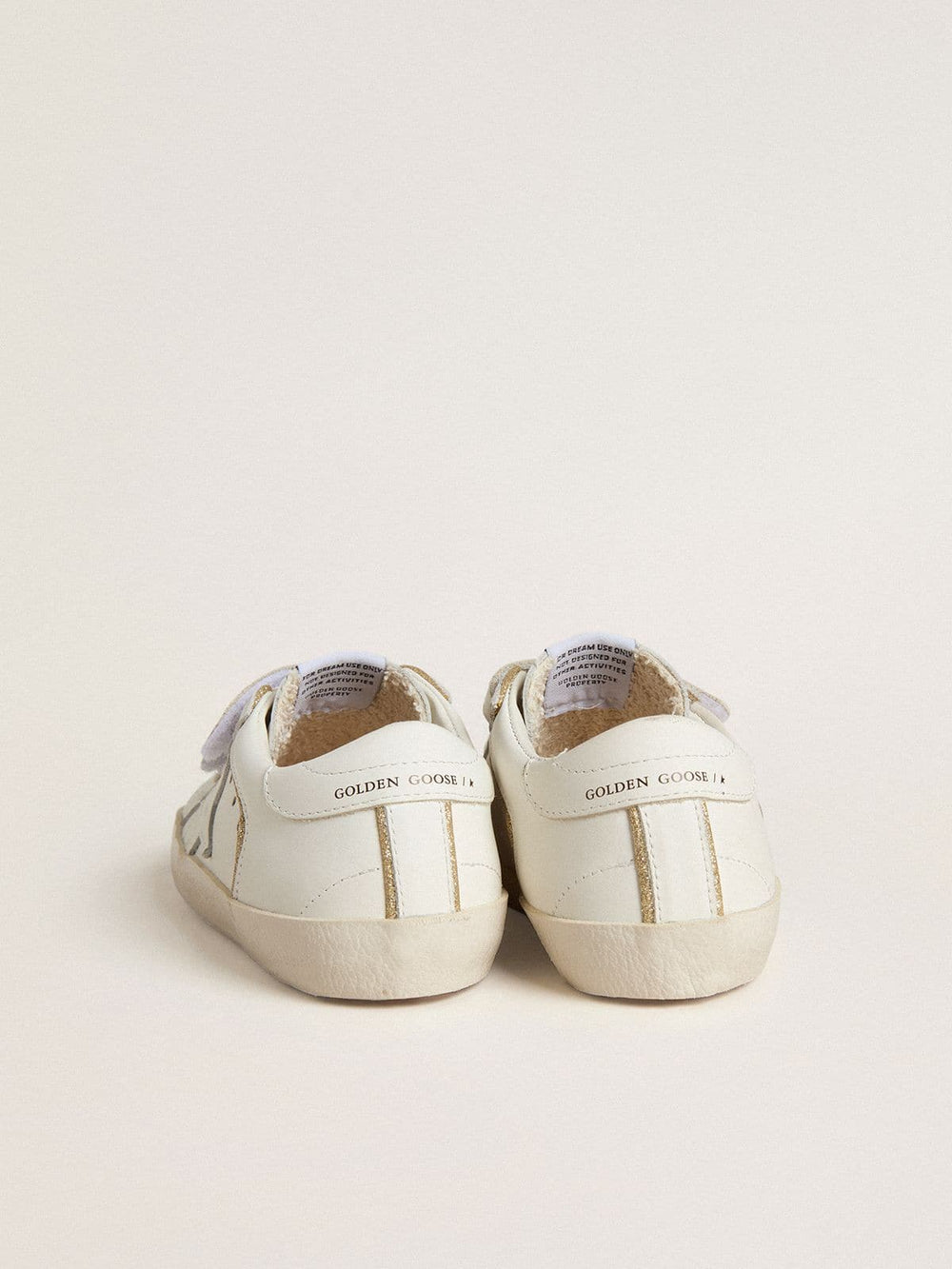 Golden Goose Junior Old School in white leather with gold details