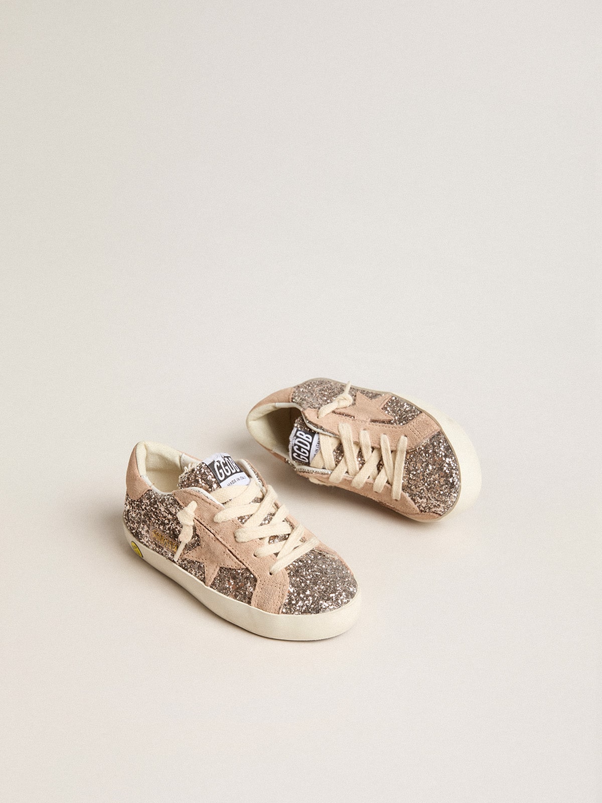 Golden Goose Junior Super-Star in glitter with suede star and heel tab