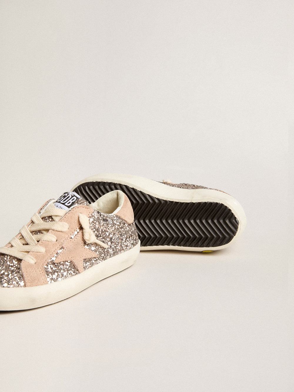 Golden Goose Junior Super-Star in glitter with suede star and heel tab